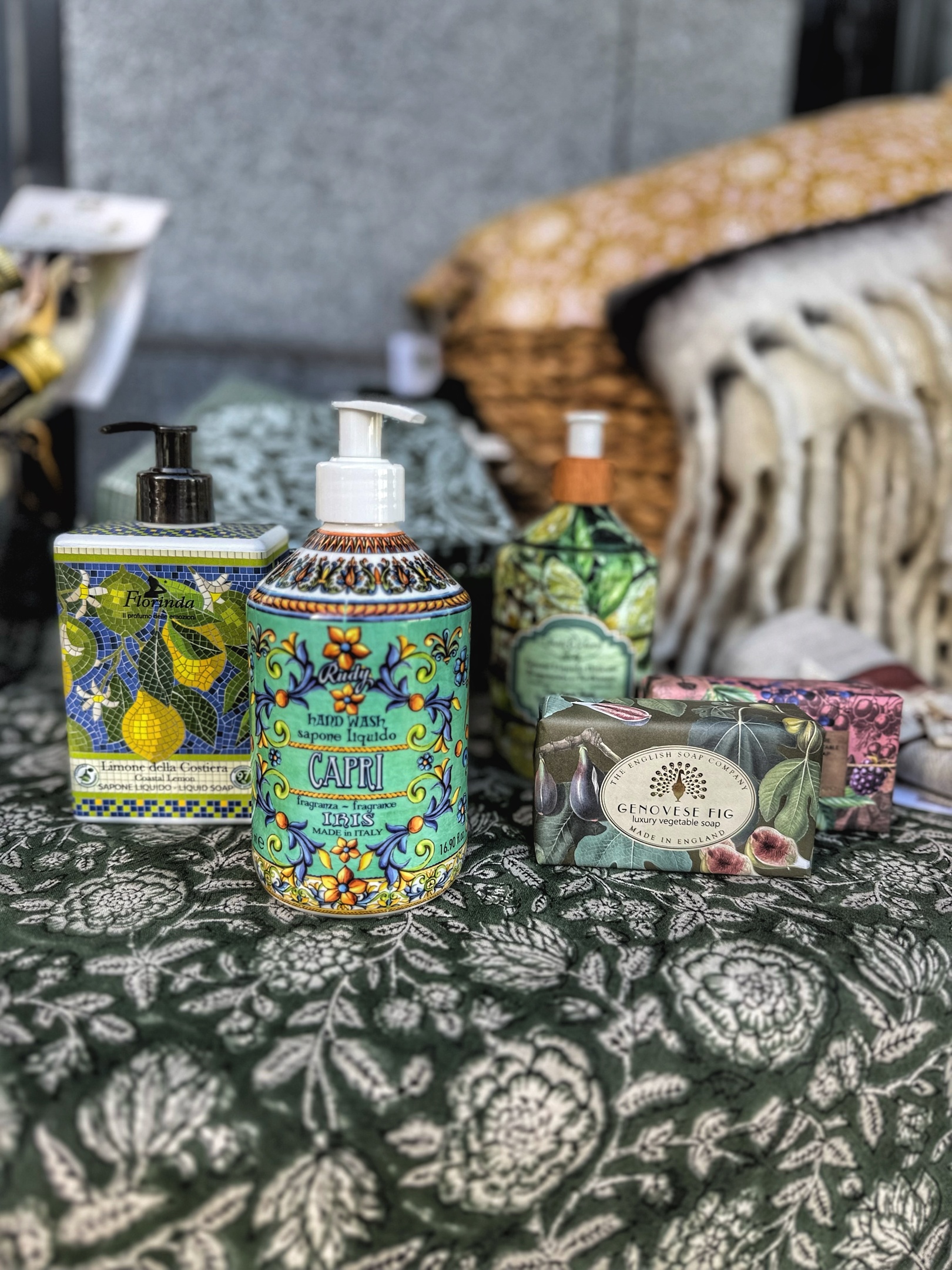 Two handmade soap bars stacked on a white background, showcasing their natural texture and color.